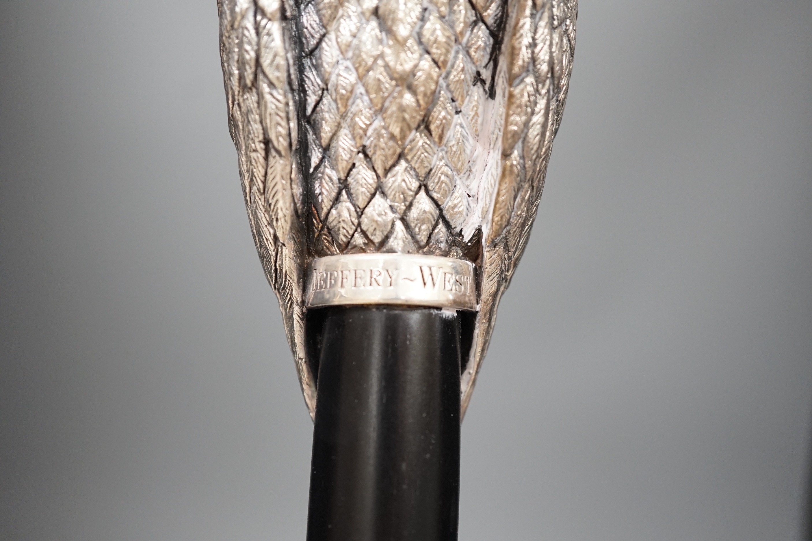 A Jeffery West umbrella with modern filled silver Thorondor eagle head handle, 93cm total length